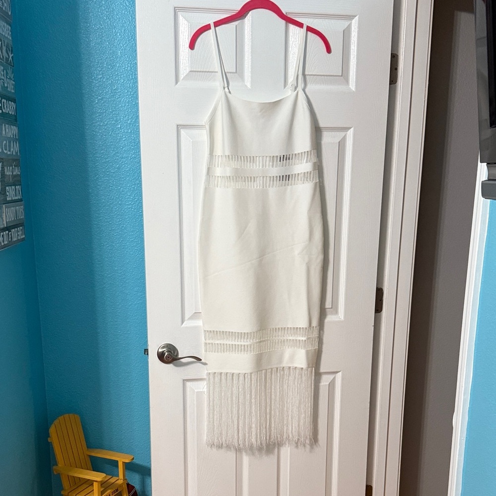 Stylish White Dress with Fringe Accents